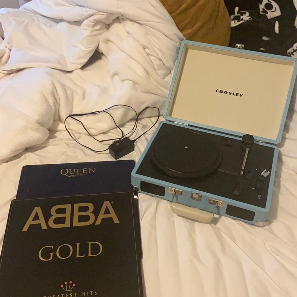 record player, plug, and two records
